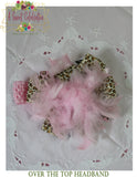 Over the Top Headband Adorned with Feathers and Ribbons in Pink and Leopard
